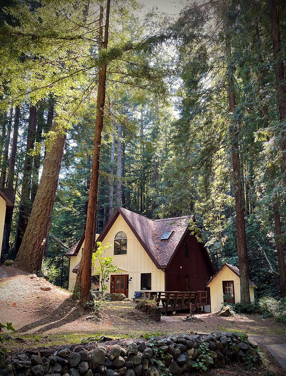 Home set in a gap in the redwoods along Alpine Creek.