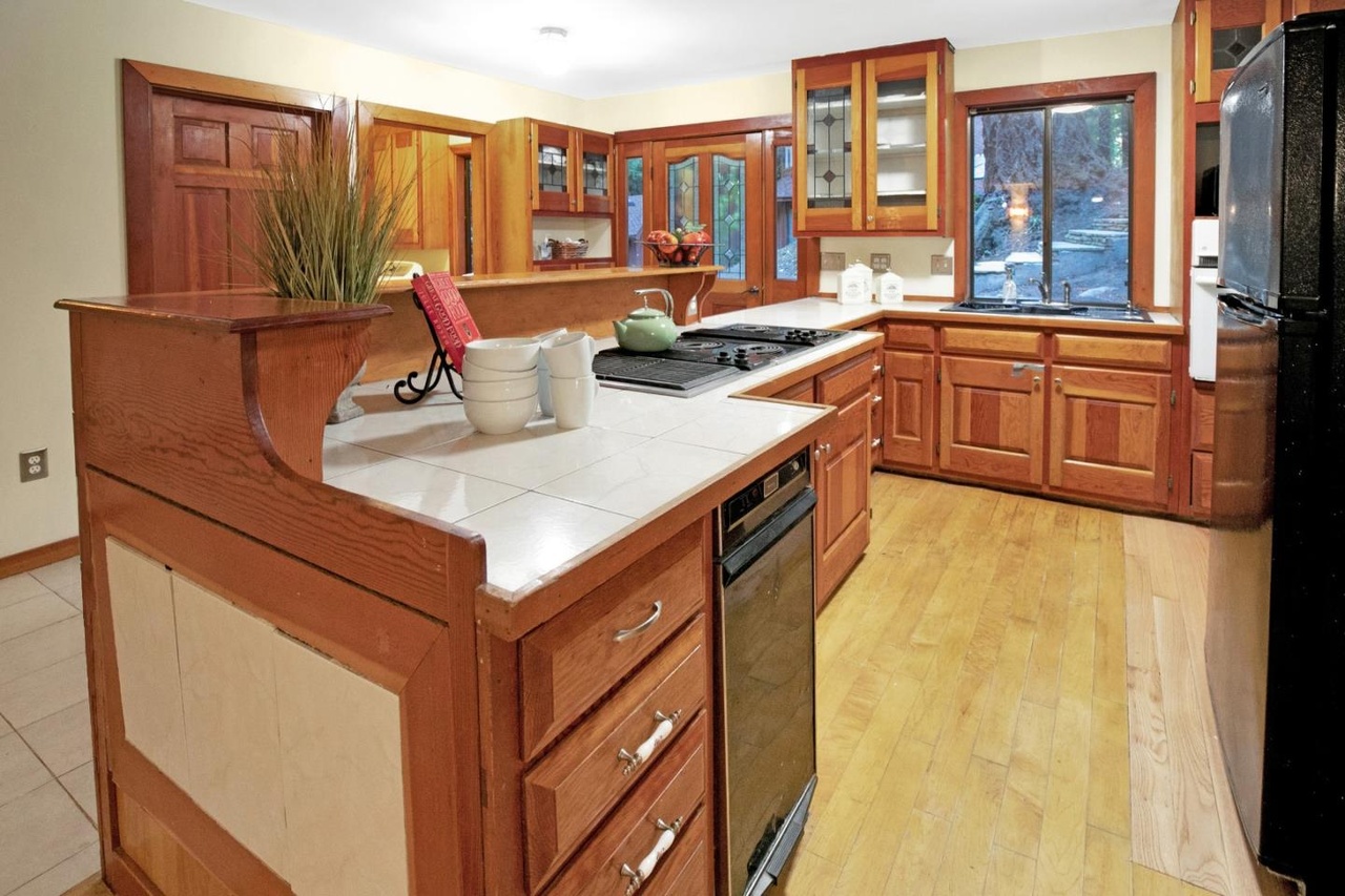 Compact, efficient kitchen with custom built-ins.