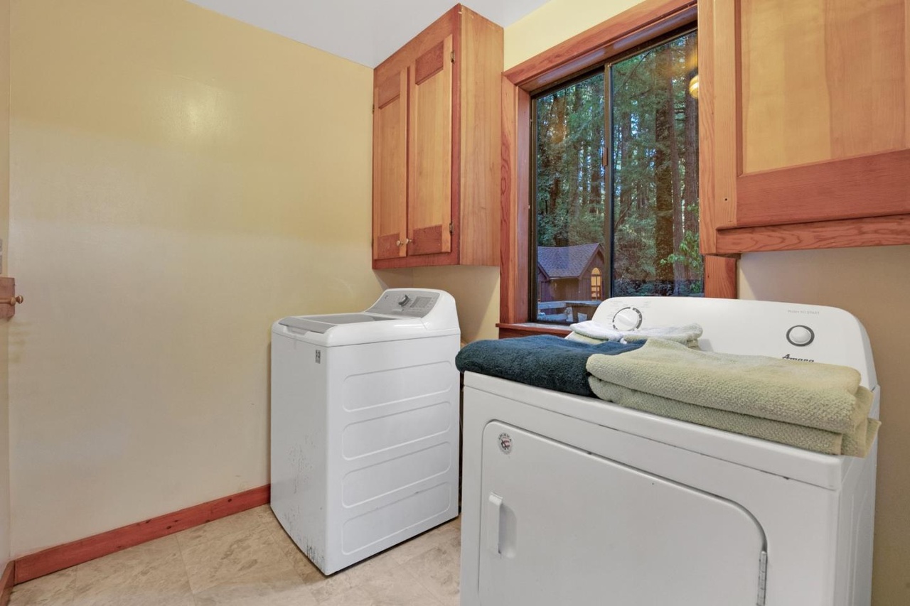 Laundry with washer and gas dryer hookups.