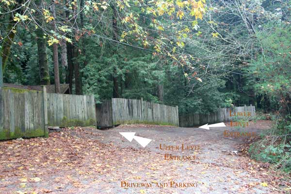 This is view as you drive in the driveway from the street.  You will park along fence by the first gate with direct access to the upper floor.
