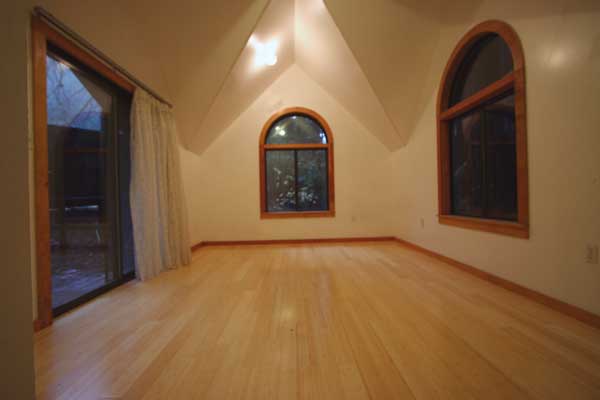 Upper floor is one room with windows in all directions.