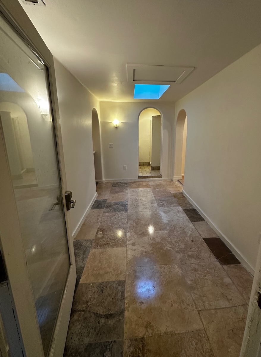 This Bonus room is 7' x 14' and is just off the living room.  It has it's own entrance into a private yard.
