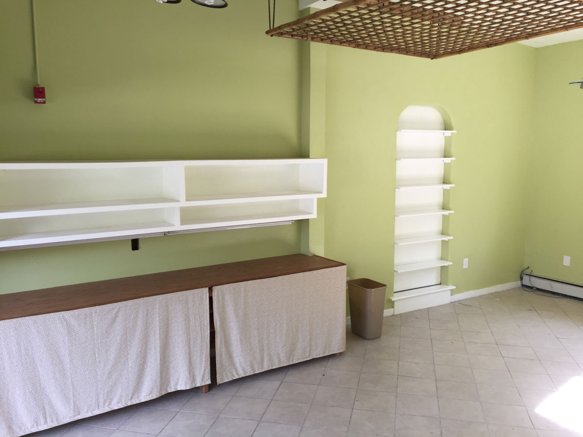 Interior wall and lighting — bright natural light from window.