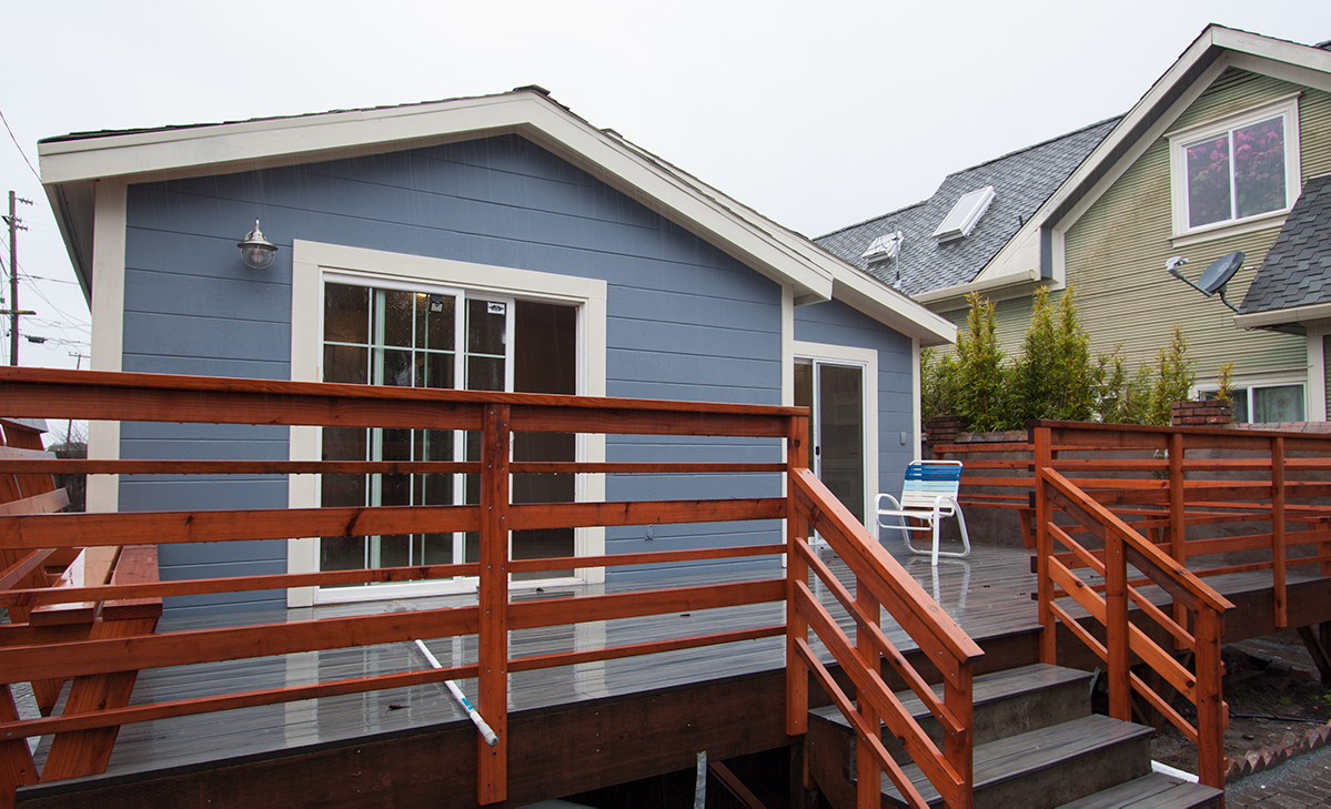 The back deck is Trex with custom redwood built-in benches.  