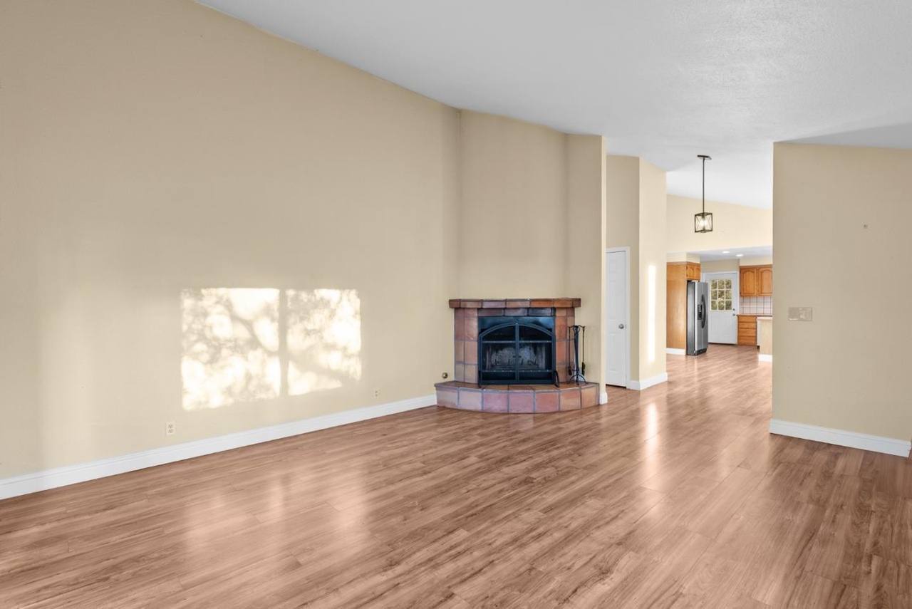 Living room is 15 x 18 with gas fireplace. 