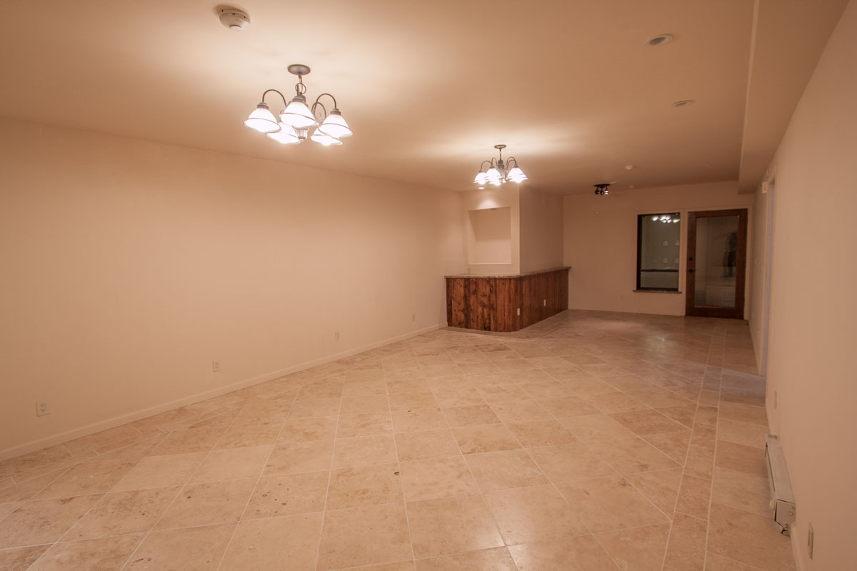 View from rear toward entry; restroom door on right.